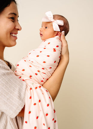 Model Wearing Lou Lou & Company Junie Swaddle Blanket