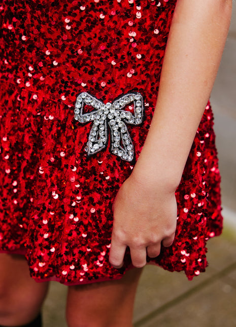 Model Wearing Lola And The Boys Ruby Bows Dress