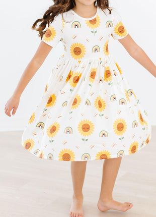 Model Wearing Mila & Rose Sunflower Pocket Twirl Dress