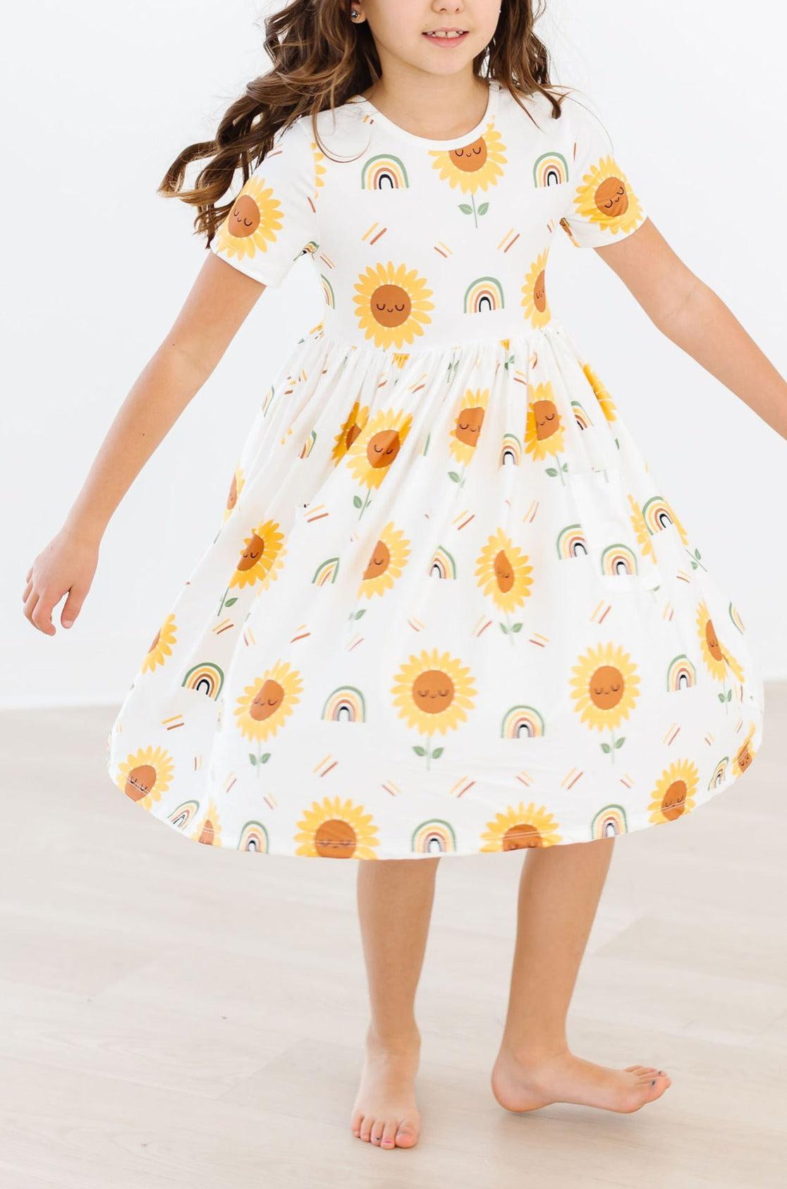 Model Wearing Mila & Rose Sunflower Pocket Twirl Dress