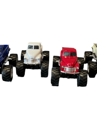Four Chevy pick up monster truck toys in the colors blue, white, red and beige. 