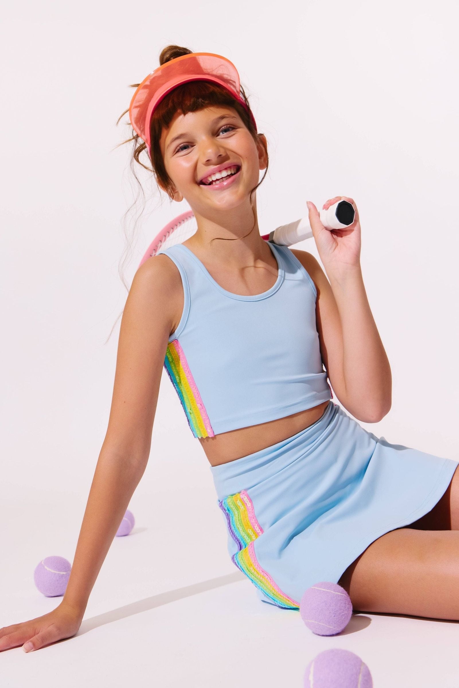 Model Wearing Lola And The Boys Blue Rainbow Sherbet Sequin Tennis Set