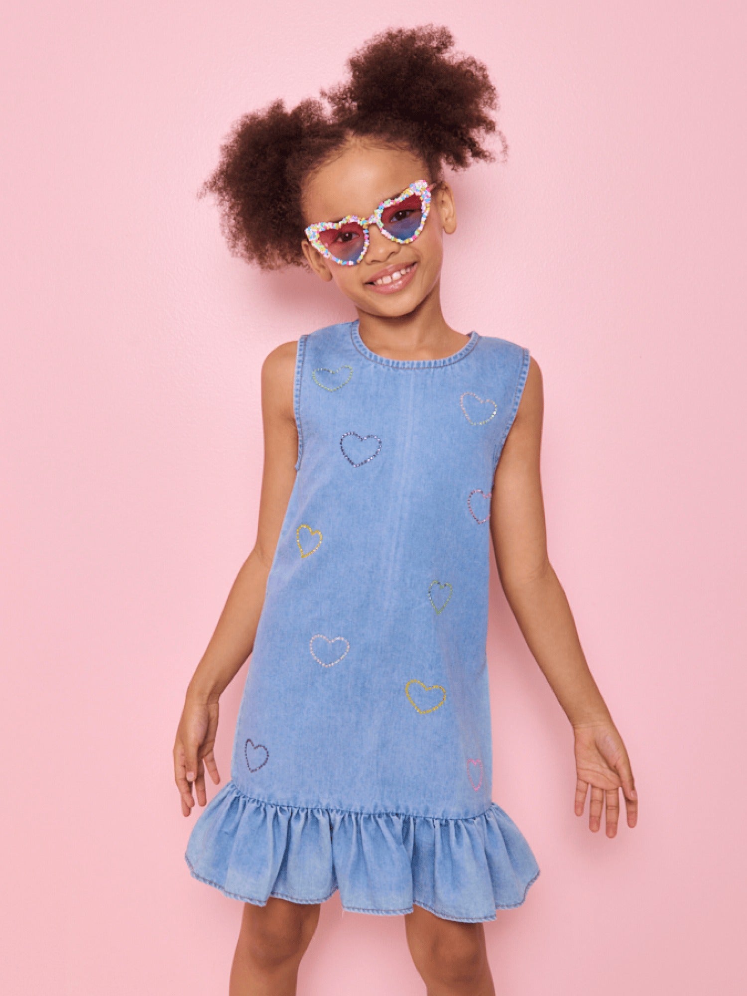 Model Wearing Lola And The Boys Crystal Rainbow Heart Denim Dress