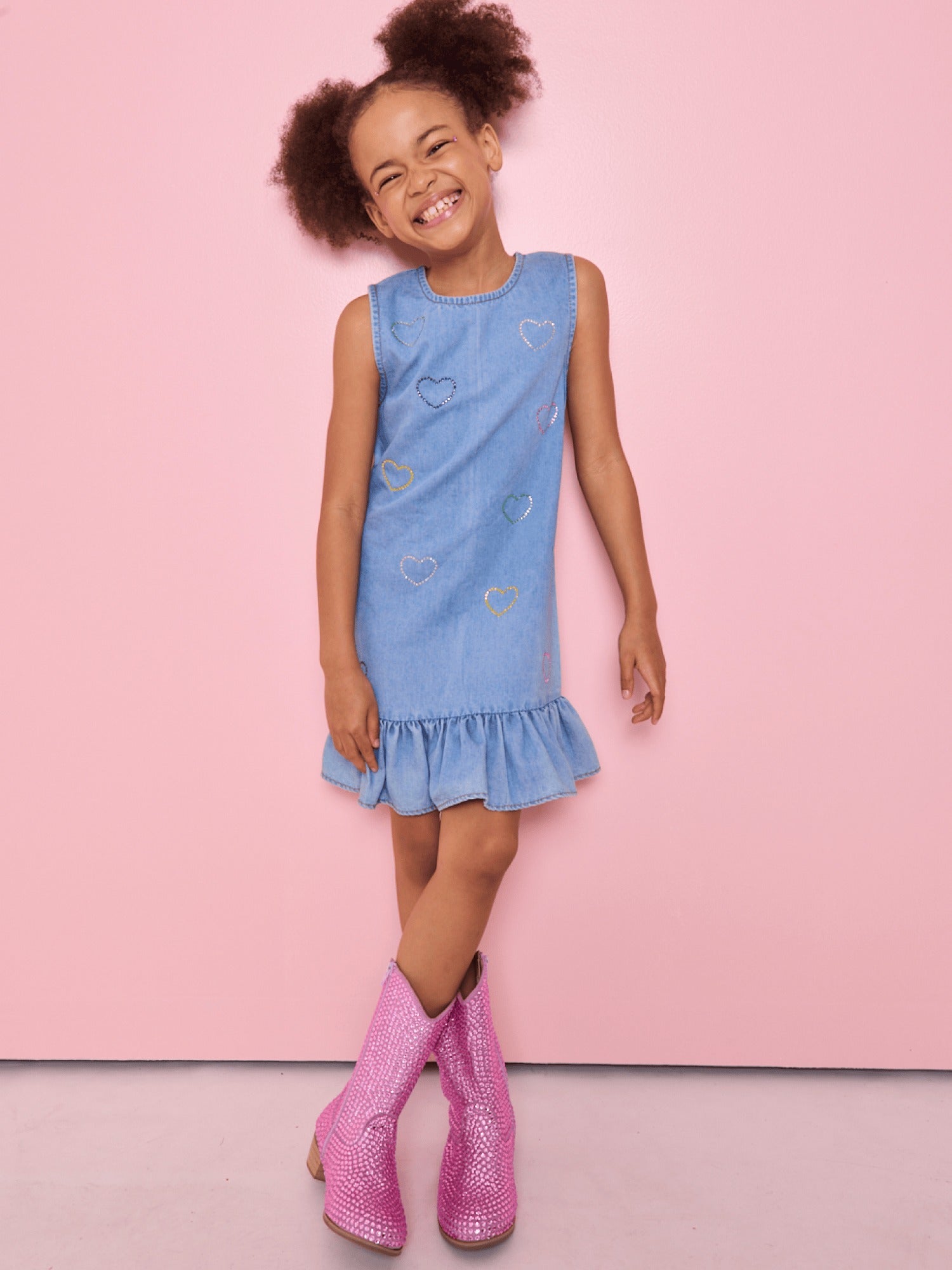 Model Wearing Lola And The Boys Crystal Rainbow Heart Denim Dress