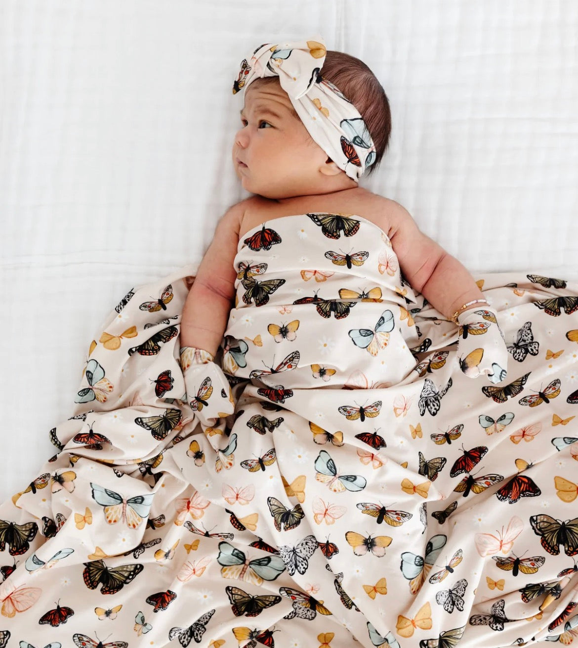 Model Wearing Lou Lou & Company Amelia Swaddle Blanket