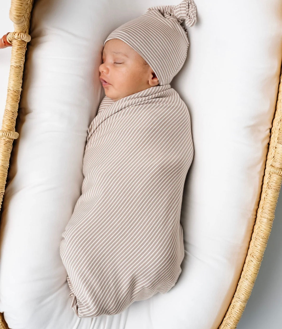 Model Wearing Lou Lou & Company Banks Swaddle Blanket