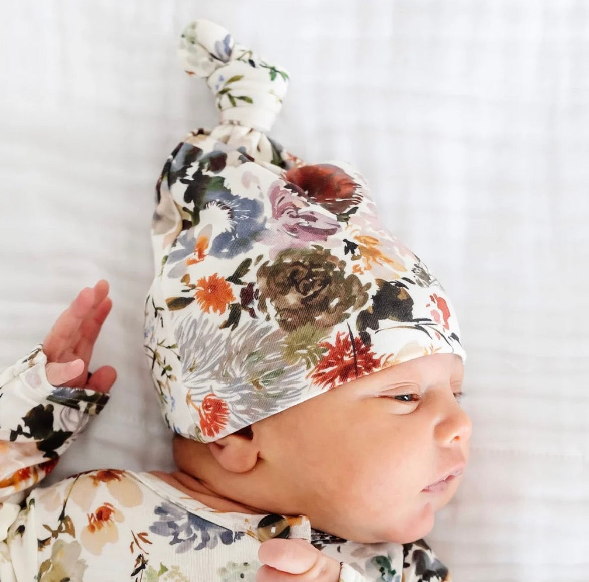 Model Wearing Lou Lou & Company Nellie Top Knot Hat