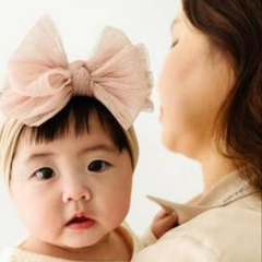 Model Wearing Baby Bling Bows Baby Bling® Tulle Fab® Soft Nylon Headband with Tulle Bow