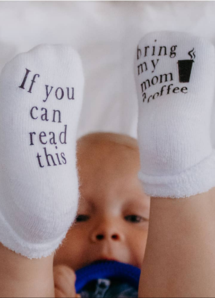 Model Wearing Dorothy's Reason If You Can Read This Bring My Mom A Coffee® Baby Socks Gifts