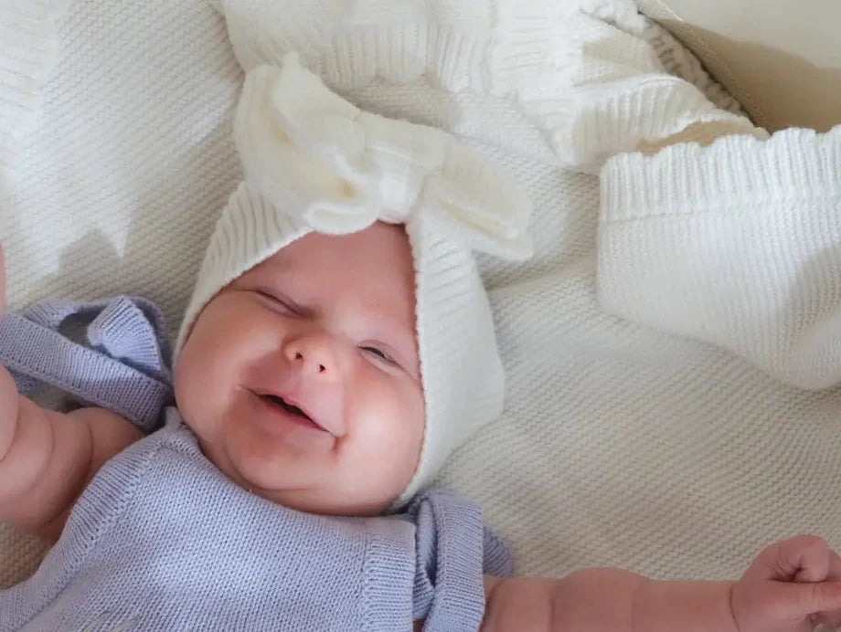 Model Wearing Pine Kids Ribbed Knit Bow Headband - Cloud
