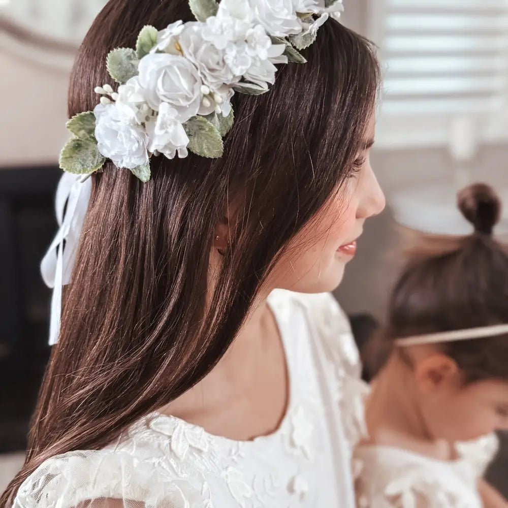 Model Wearing A Little Lacey Aria Girls White Flower Crown