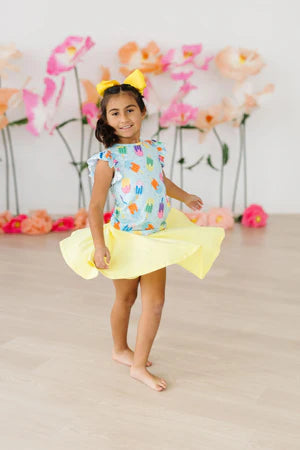 Model Wearing Mila & Rose Sweet Treat Ruffle Tee