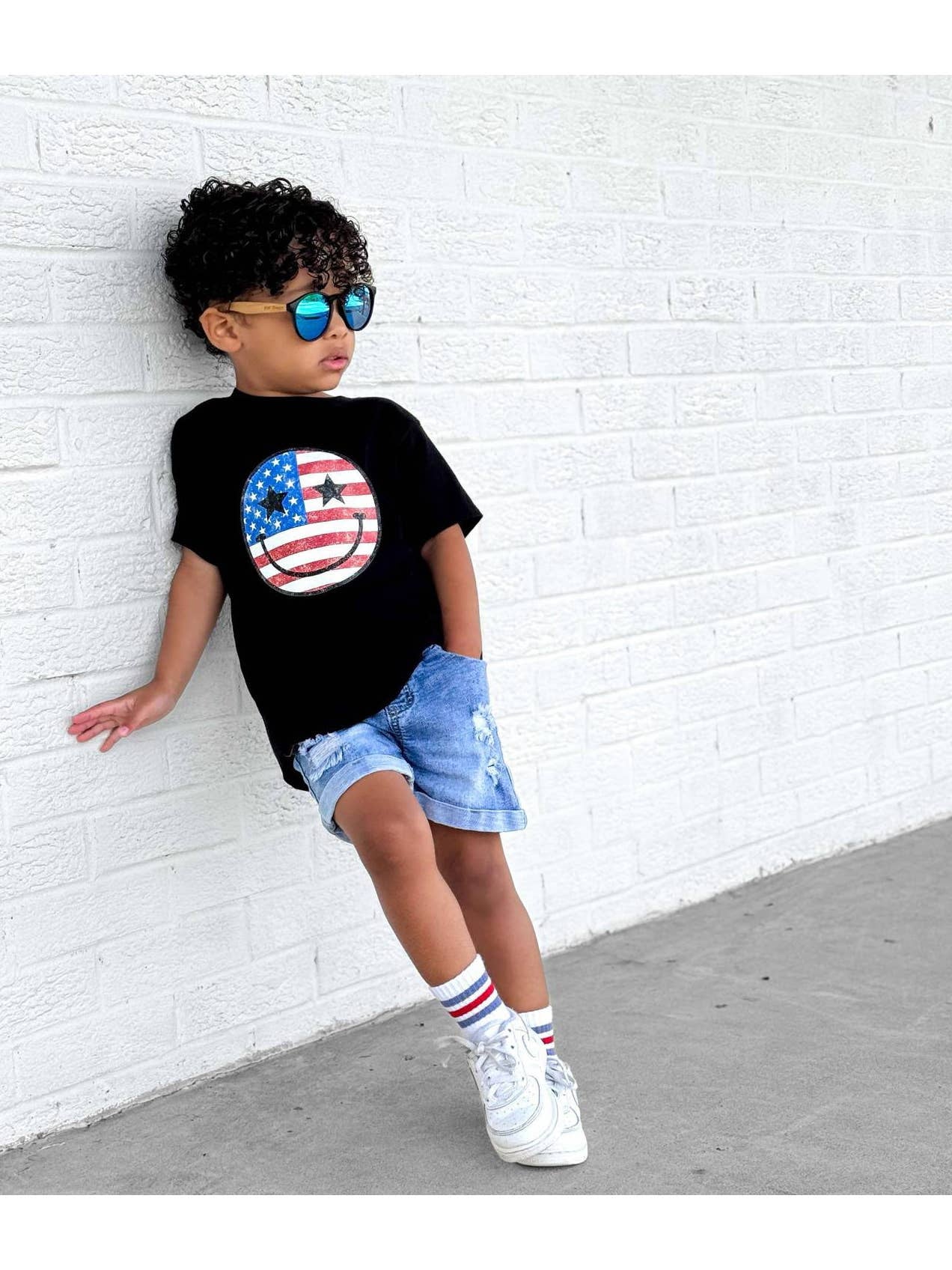 Model Wearing Holland Ave Kids Patriotic Fourth of July Smiley Graphic Tee