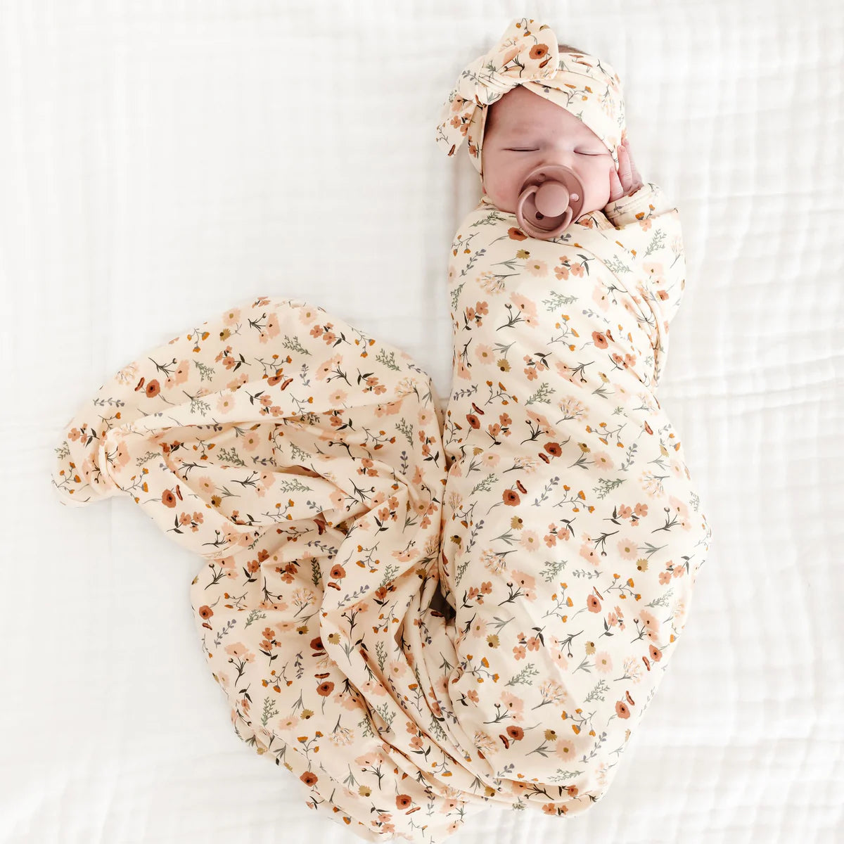 Model Using Lou Lou  & Company Rachel Swaddle Blanket