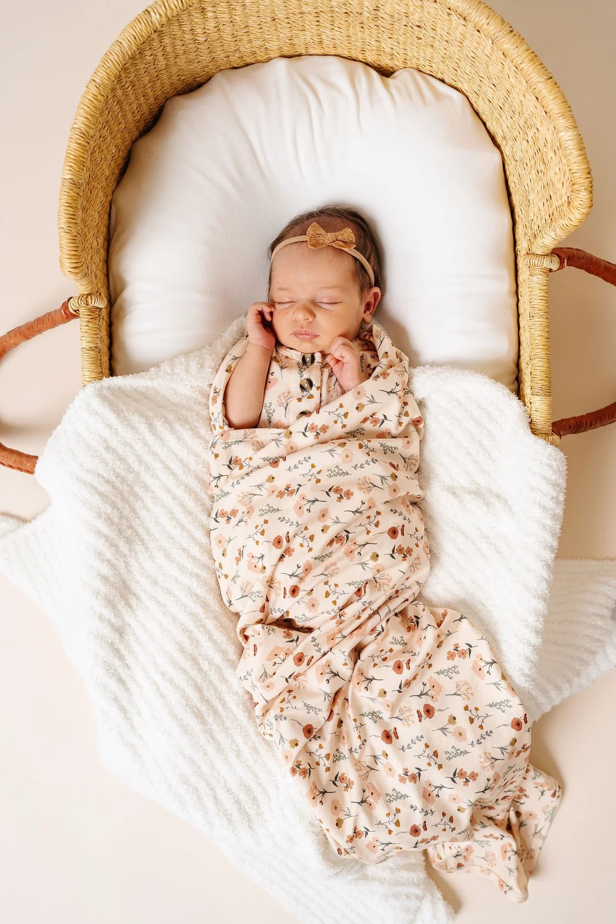 Model Using Lou Lou  & Company Rachel Swaddle Blanket
