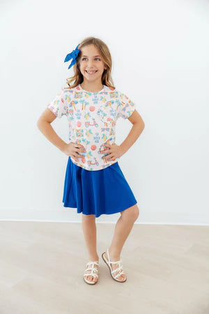Model Wearing Mila & Rose La Dolce Vita Ruffle Pocket Tee