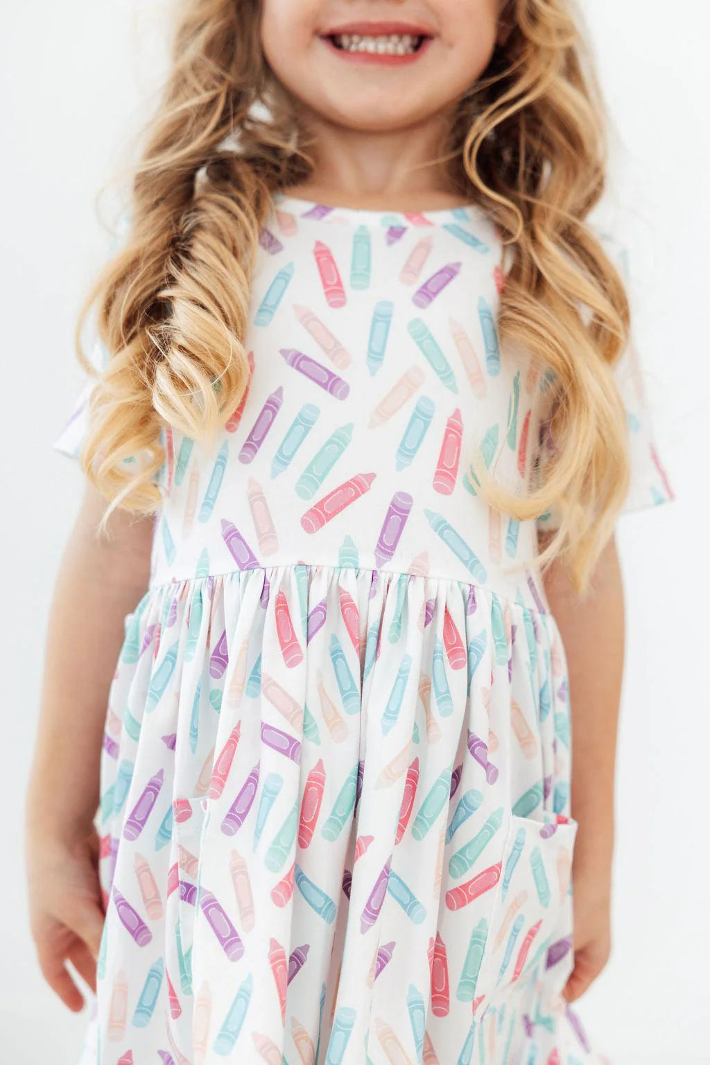 Model Wearing Mila & Rose COLOR CRAYONS S/S POCKET TWIRL DRESS