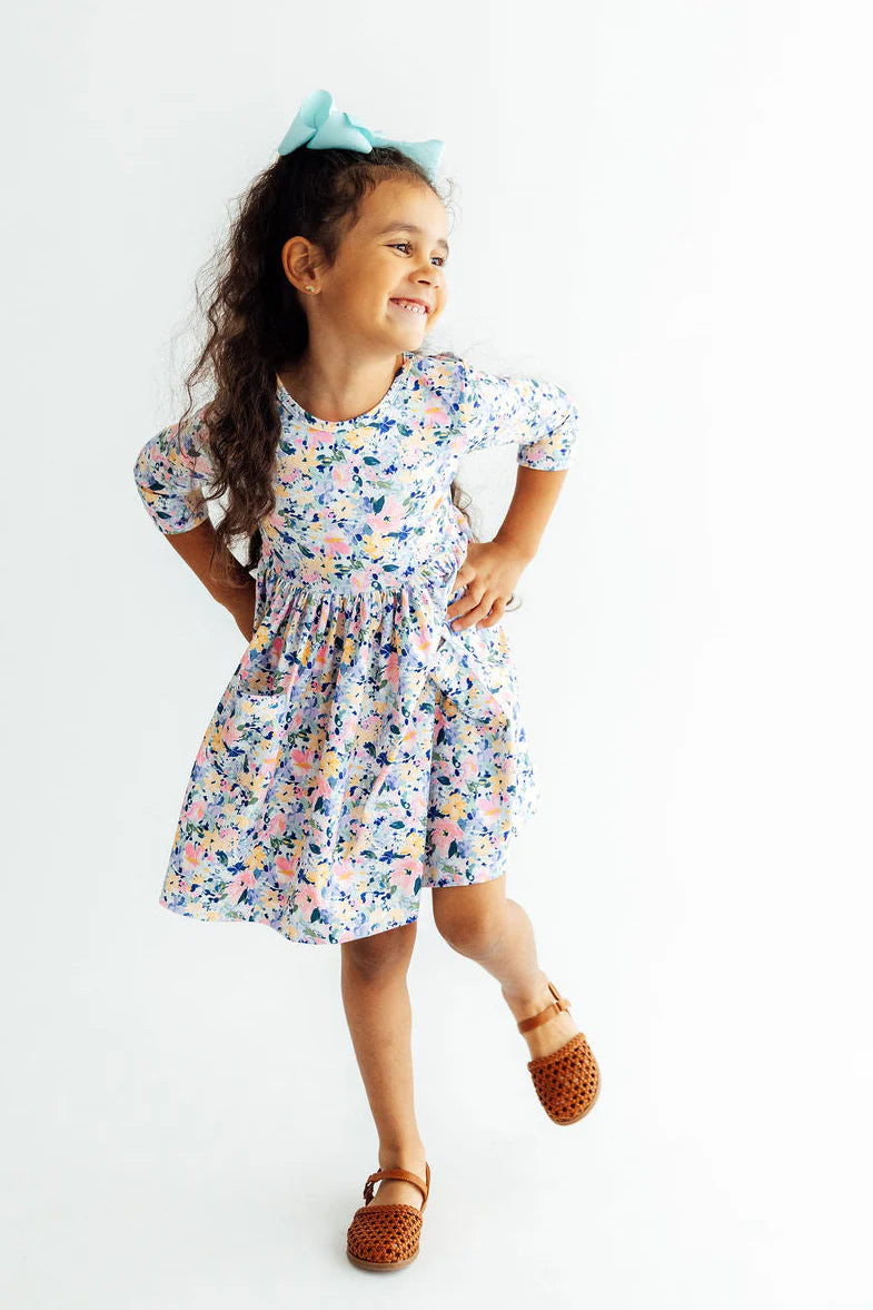 Model Wearing Mila & Rose Fall Floral 3/4 Sleeve Pocket Twirl Dress