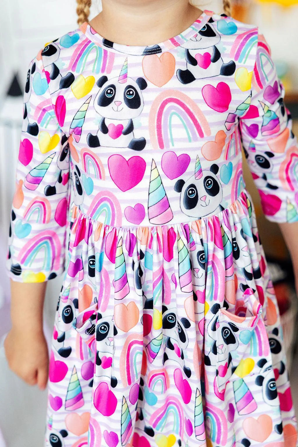 Model Wearing Mila & Rose Peace, Love & Pandacorns 3/4 Sleeve Pocket Twirl Dress