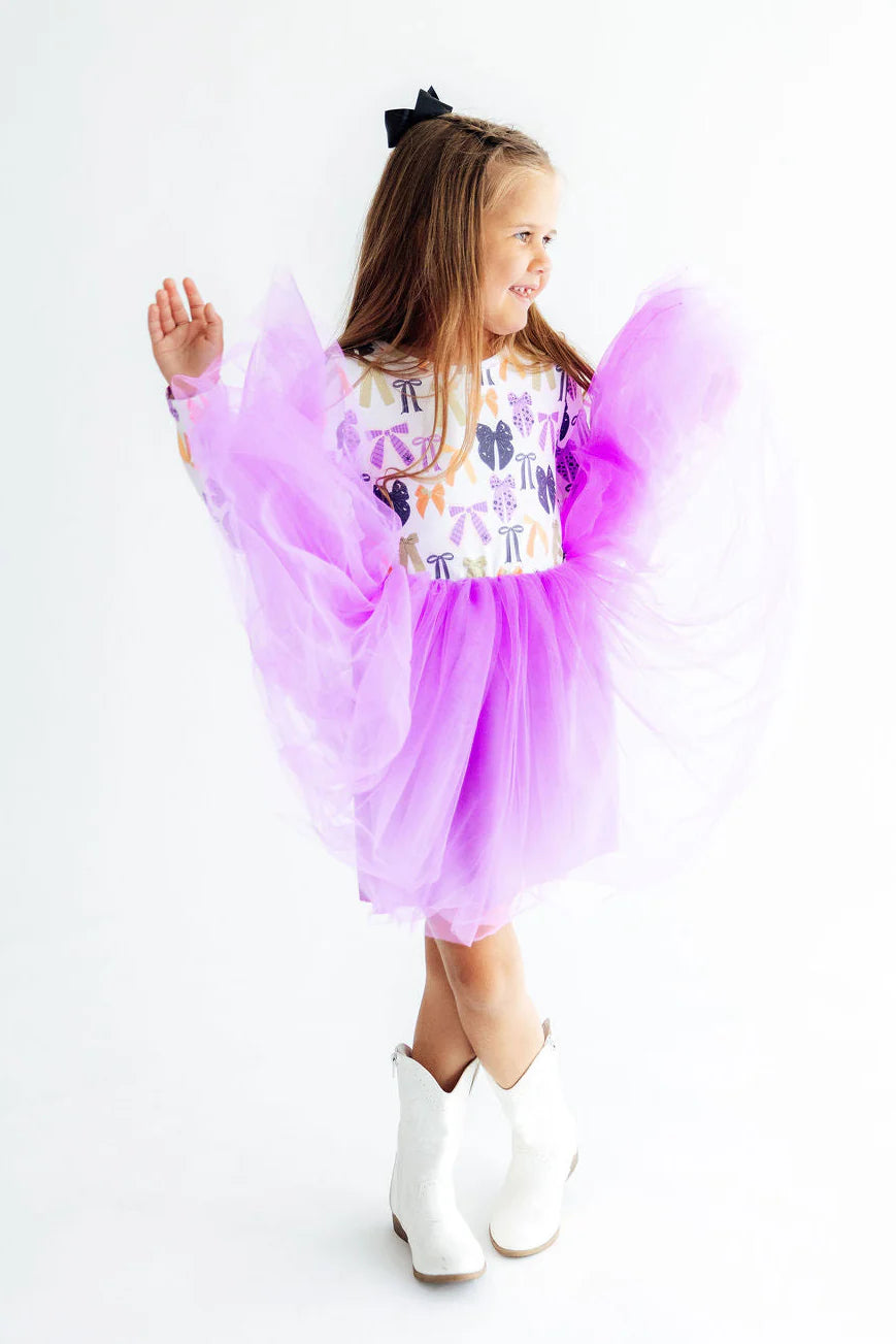 Model Wearing Mila & Rose Tied With A Boo Long Sleeve Tutu Dress