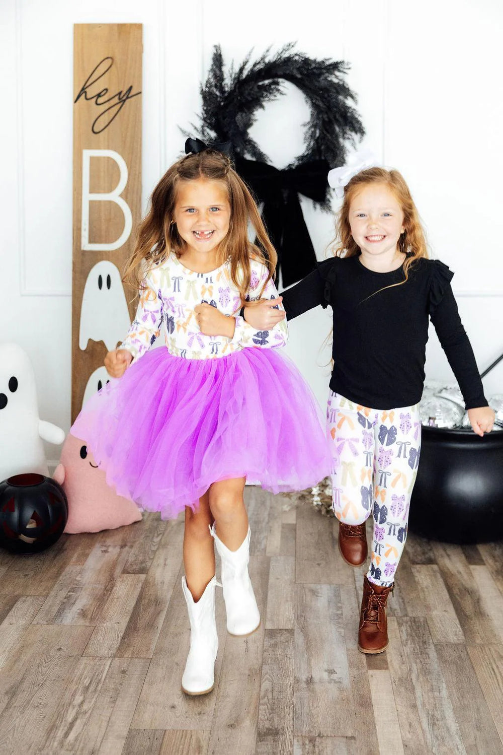 Model Wearing Mila & Rose Tied With A Boo Long Sleeve Tutu Dress