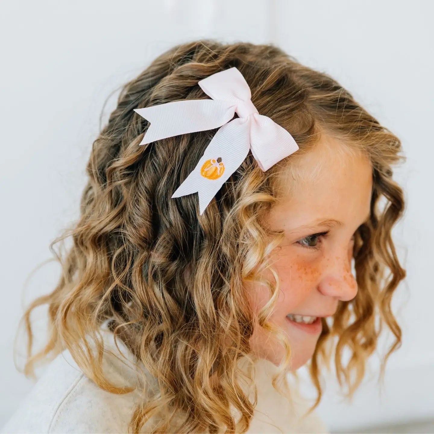 Model Wearing Sweet Wink Pumpkin Embroidered Bow Clip - Hair Bows - Hair Accessories