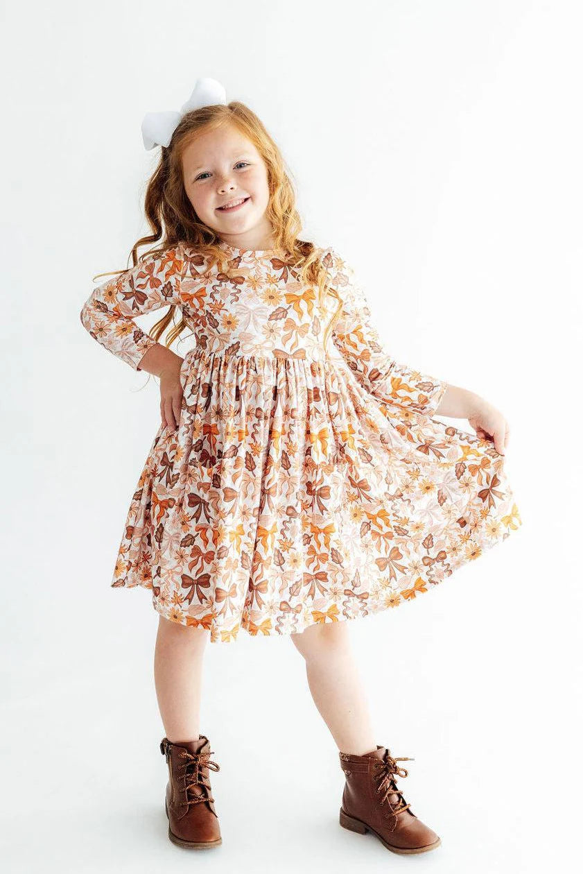 Model Wearing Mila And Rose Fall Harvest Pocket Twirl Dress