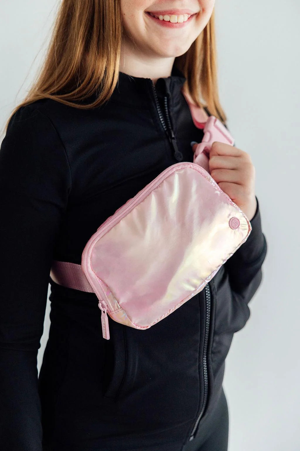 Model Wearing Mila & Rose Pink Iridescent Belt Bag