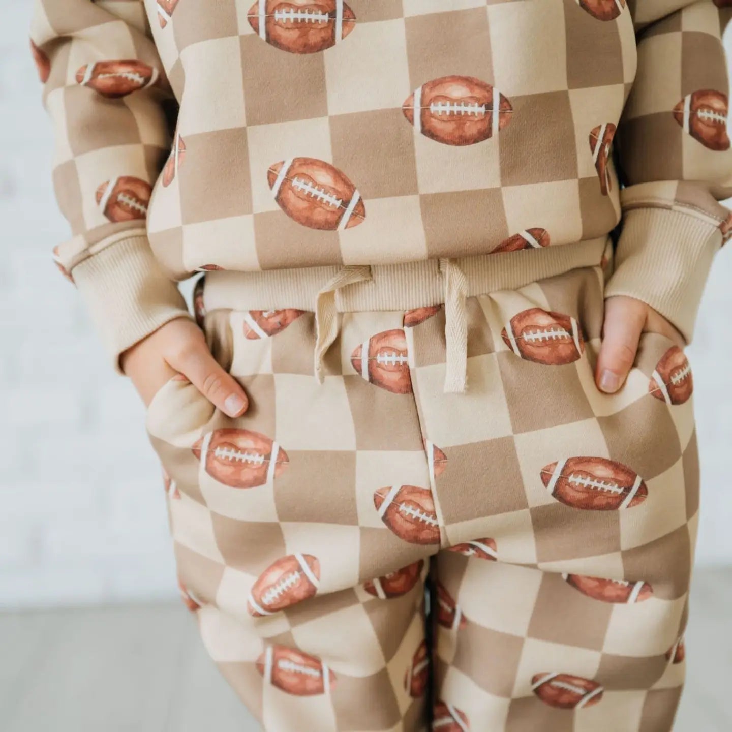Model Wearing Sweet Winks Football Checkered Jogger & Sweatshirt - Boys Clothing - Game Day