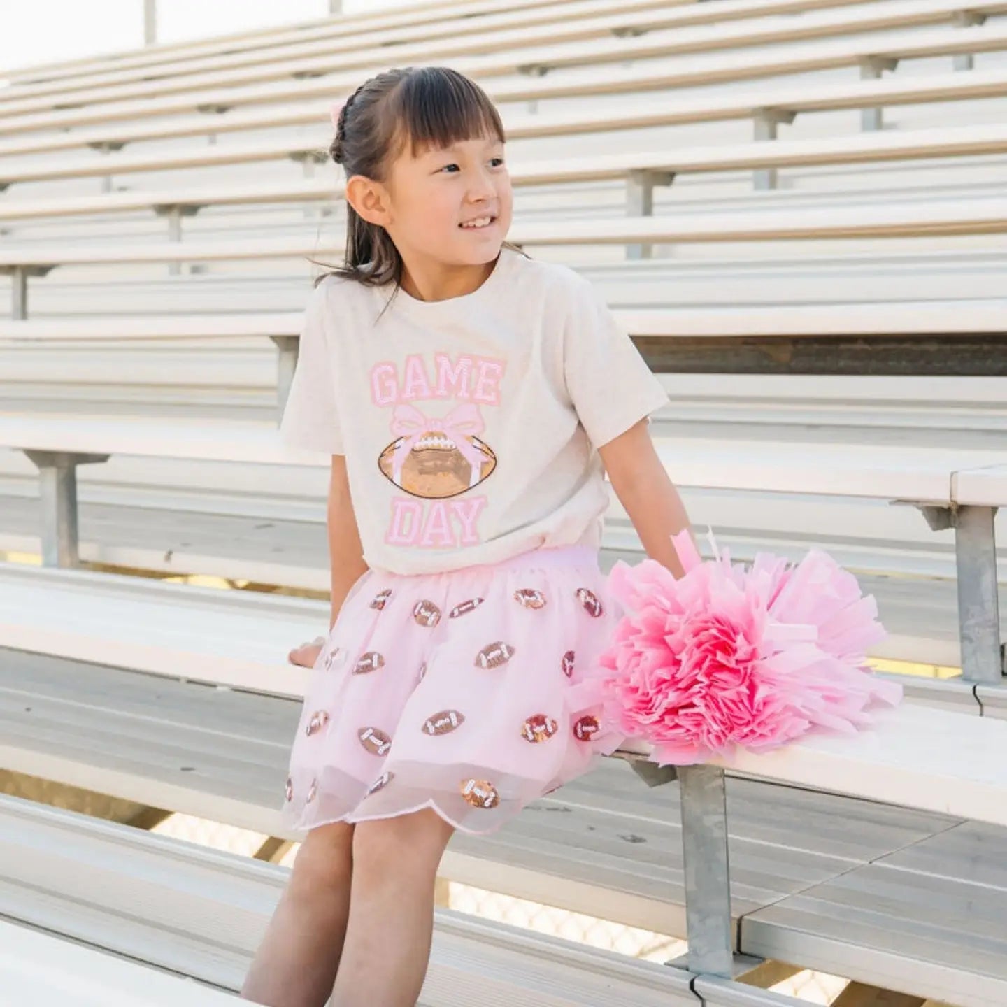 Model Wearing Sweet Wink Mini Sequin Footballs Tutu Skirt - Game Day - Kids Clothing & Game Day Sequin Tee