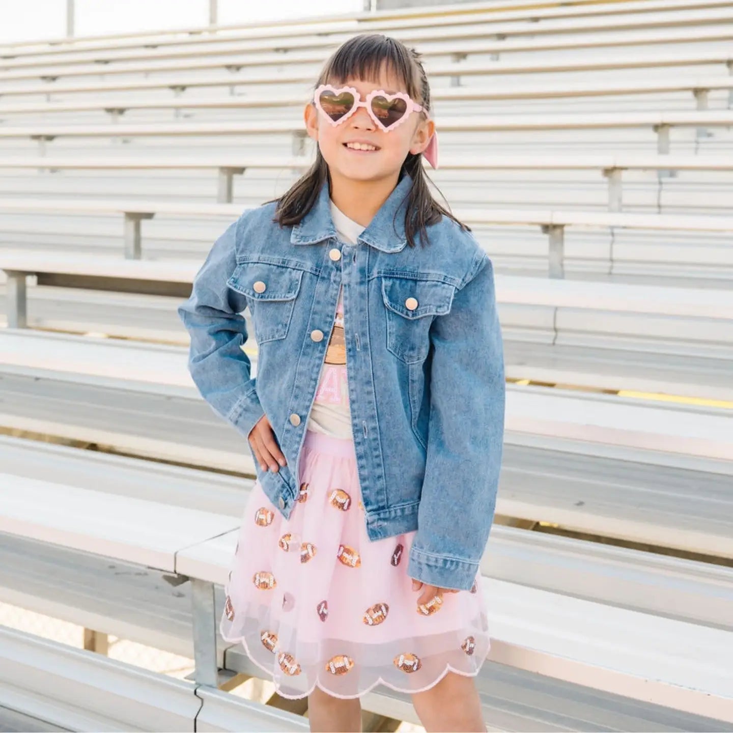 Model Wearing Sweet Wink Mini Sequin Footballs Tutu Skirt - Game Day - Kids Clothing