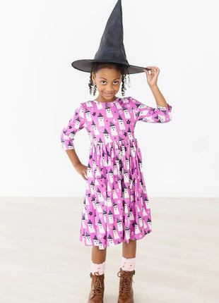 Model Wearing Mila & Rose WITCHES BOO 3/4 SLEEVE POCKET TWIRL DRESS