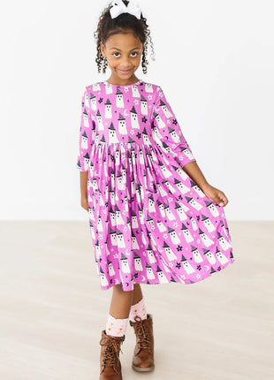 Model Wearing Mila & Rose WITCHES BOO 3/4 SLEEVE POCKET TWIRL DRESS