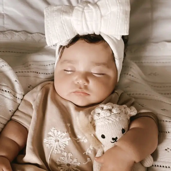 Model Wearing Luna + Luca Pointelle Bow Headband - White