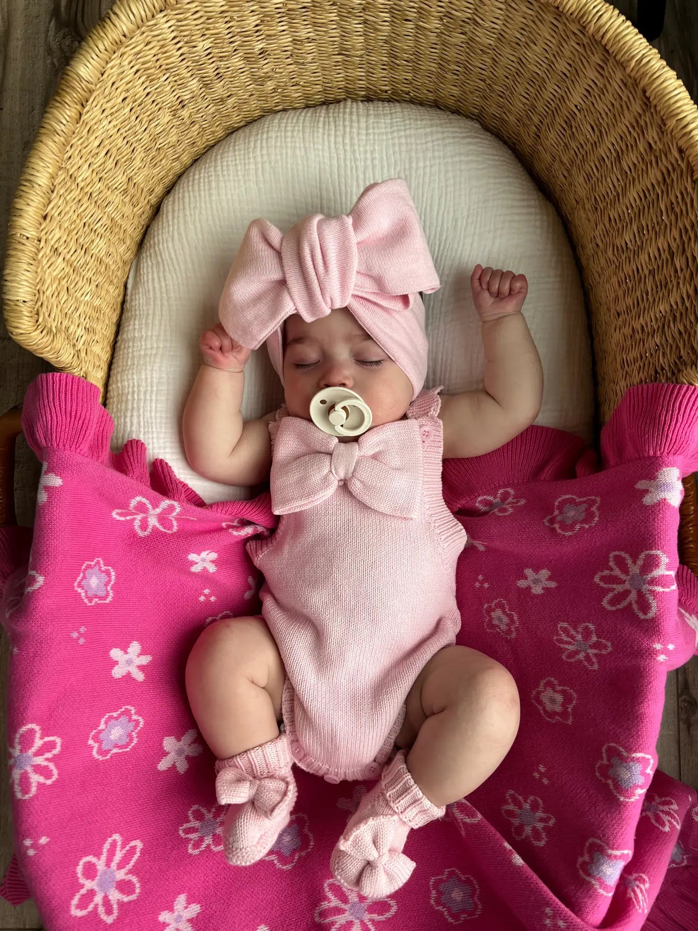 Model Wearing Luna + Luca Oversized Bow Romper - Powder Pink