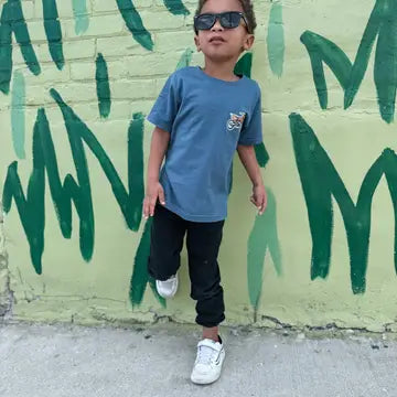 Model Wearing Raising Brave Brave Kid Moto Tee