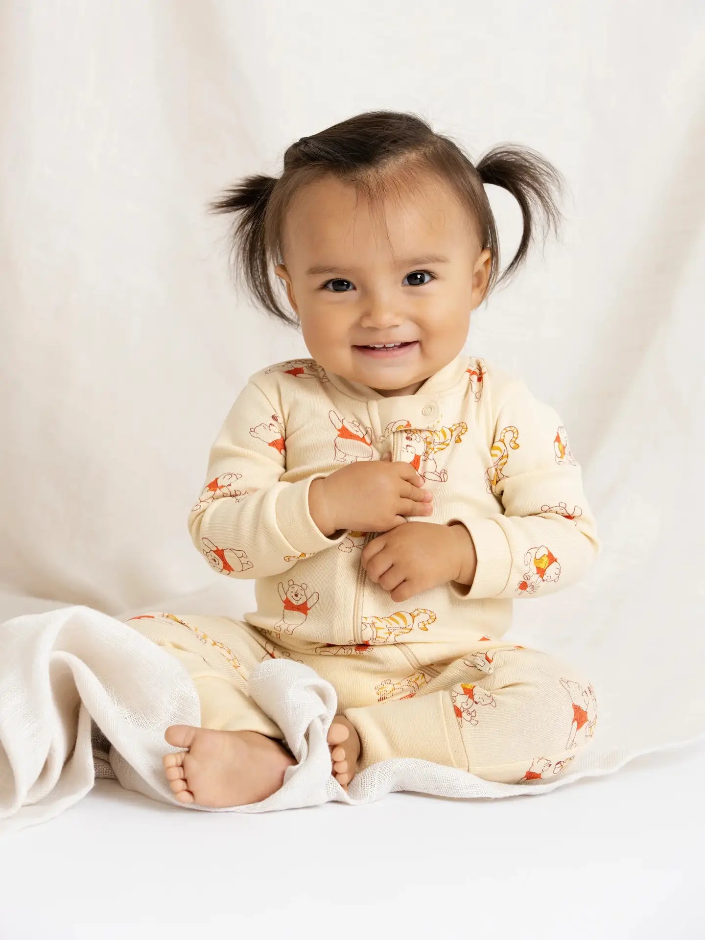 Model Wearing Monica + Andy One-Piece Baby Pajamas_winnie the Pooh