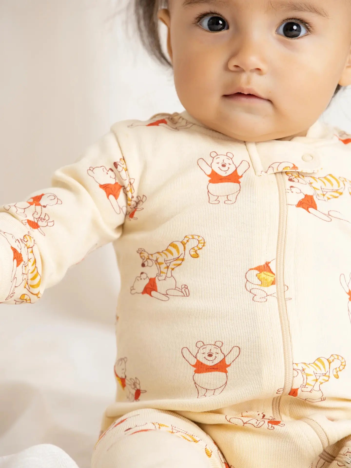 Model Wearing Monica + Andy One-Piece Baby Pajamas_winnie the Pooh
