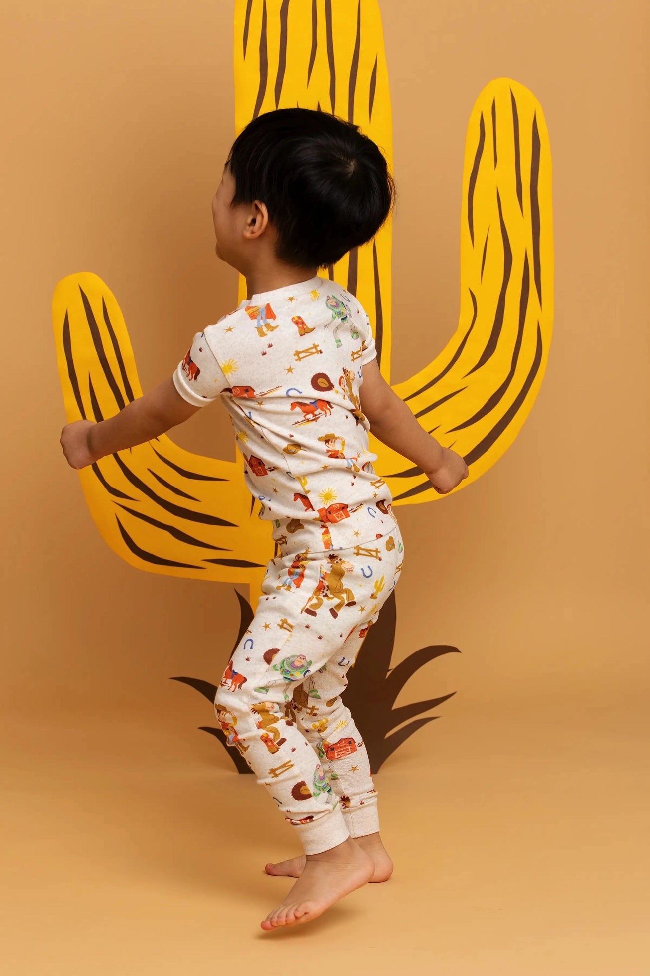 Model Wearing Monica + Andy Short Sleeve Two-Piece Pajama Set_toy Story Western Friends