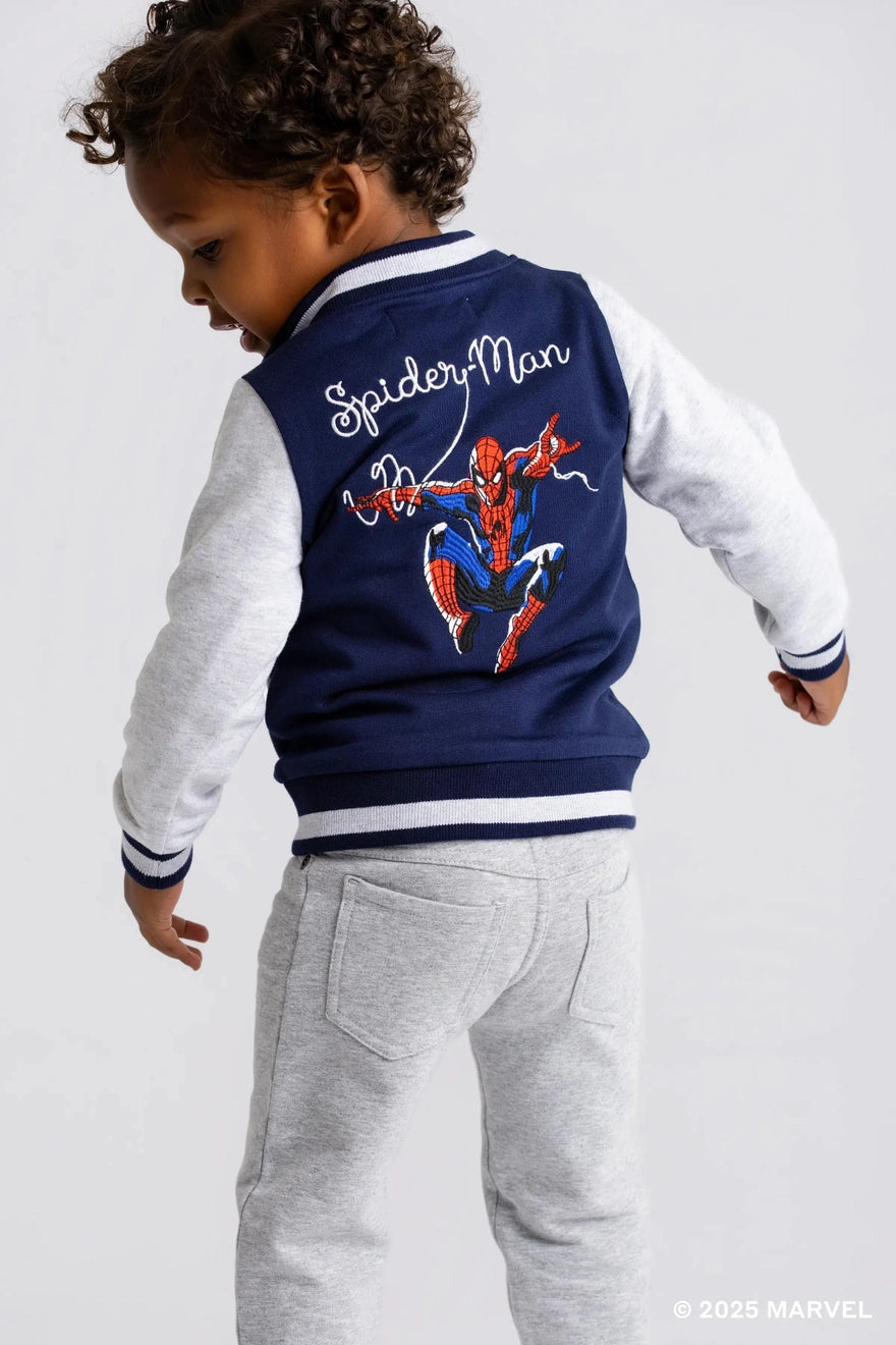 Model Wearing Monica + Andy Zip Bomber Jacket_marvel Spider-Man On Blue