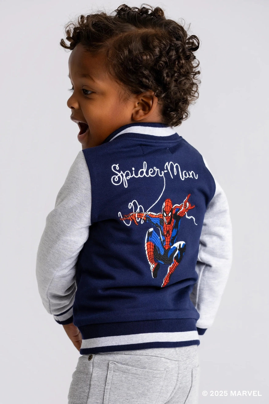 Model Wearing Monica + Andy Zip Bomber Jacket_marvel Spider-Man On Blue