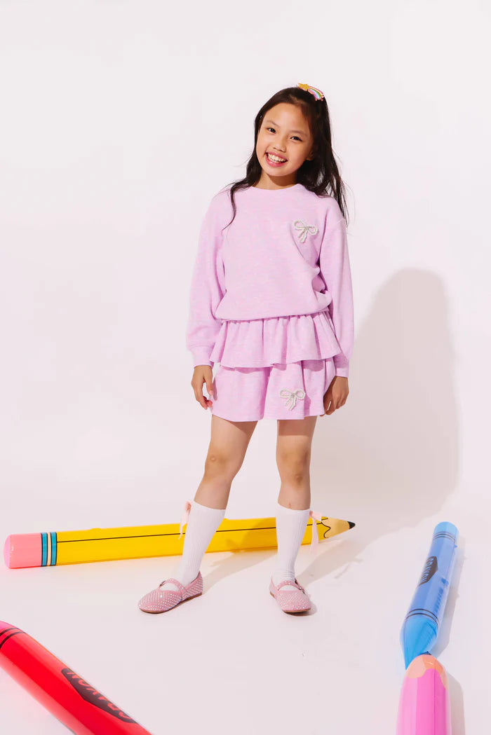 Model Wearing  Lola And The Boys Super Soft Pearl Bow Set