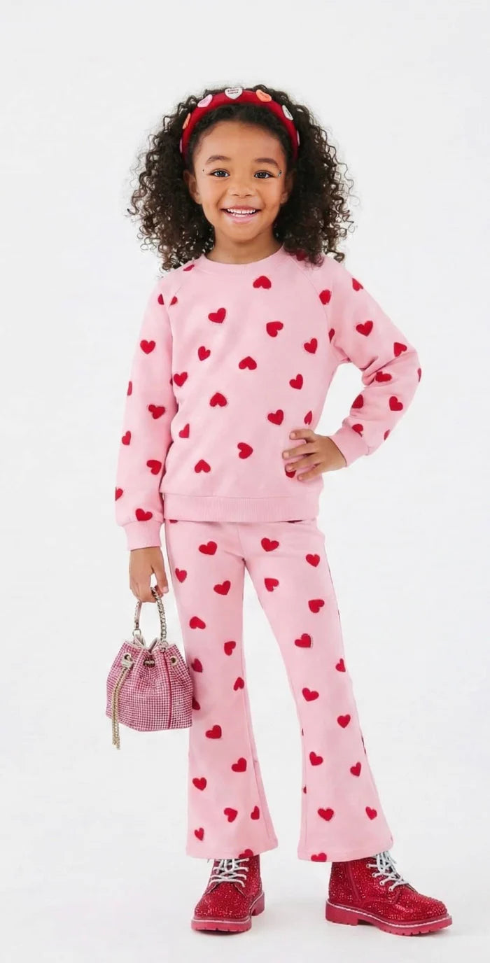 Model Wearing Lola And The Boys Pink Sparkle Sweetheart Lounge Set