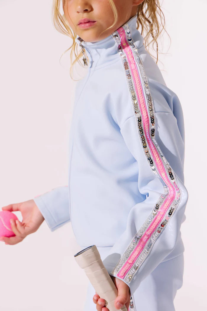 Model Wearing Lola And The Boys Rainbow Stripe Soft Scuba Tracksuit