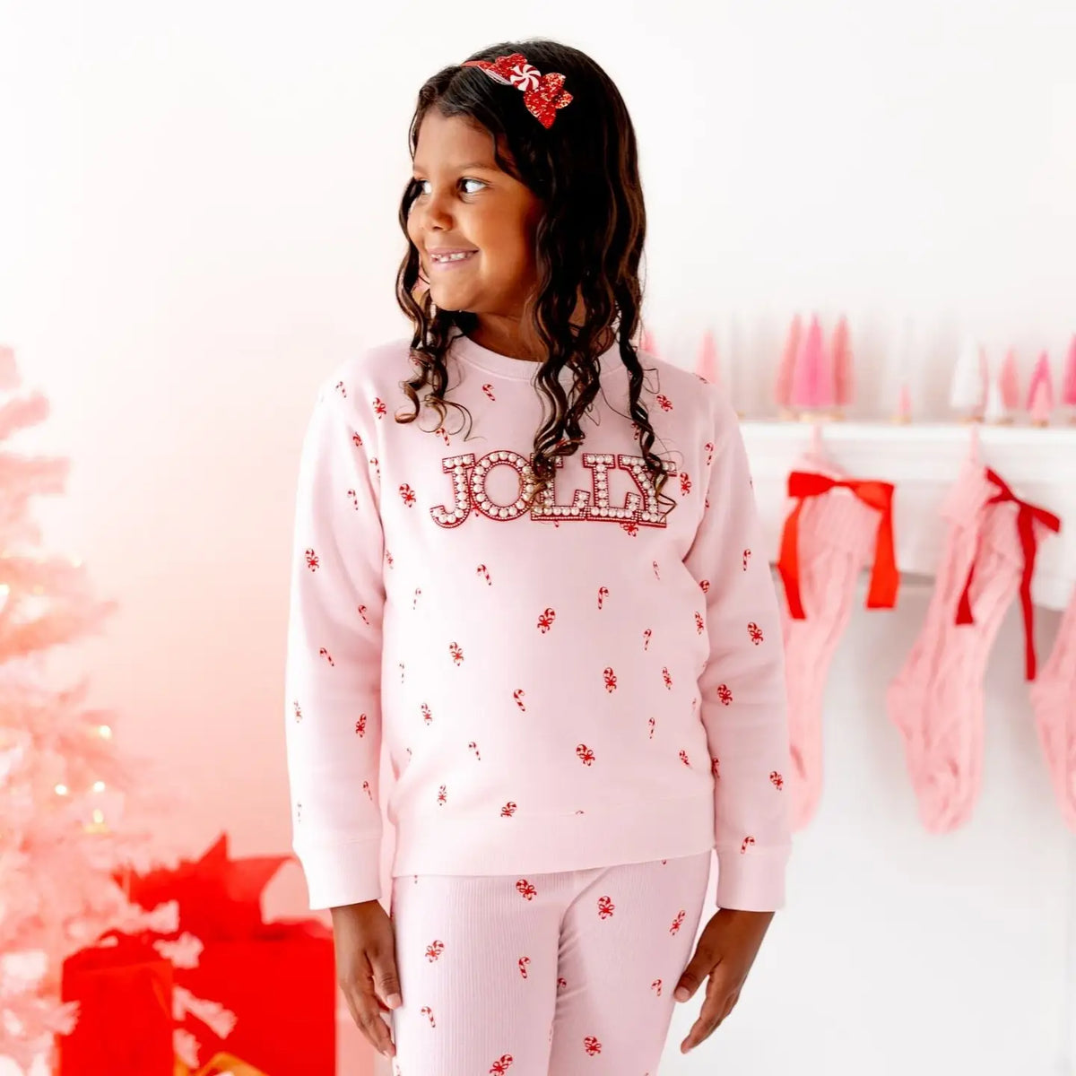 Model Wearing Sweet Wink Peppermint Glitter Christmas Bow Headband - Hair Accessories