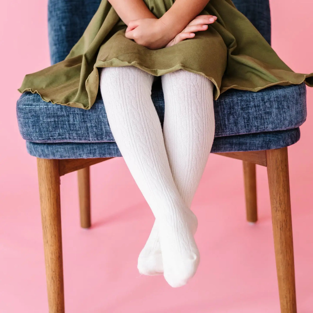 Model Wearing Little Stocking Co. Ivory Cable Knit Tights