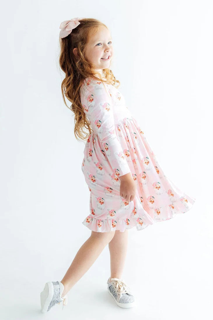 Model Wearing Mila & Rose Storybook Santa Ruffle Hem Twirl Dress