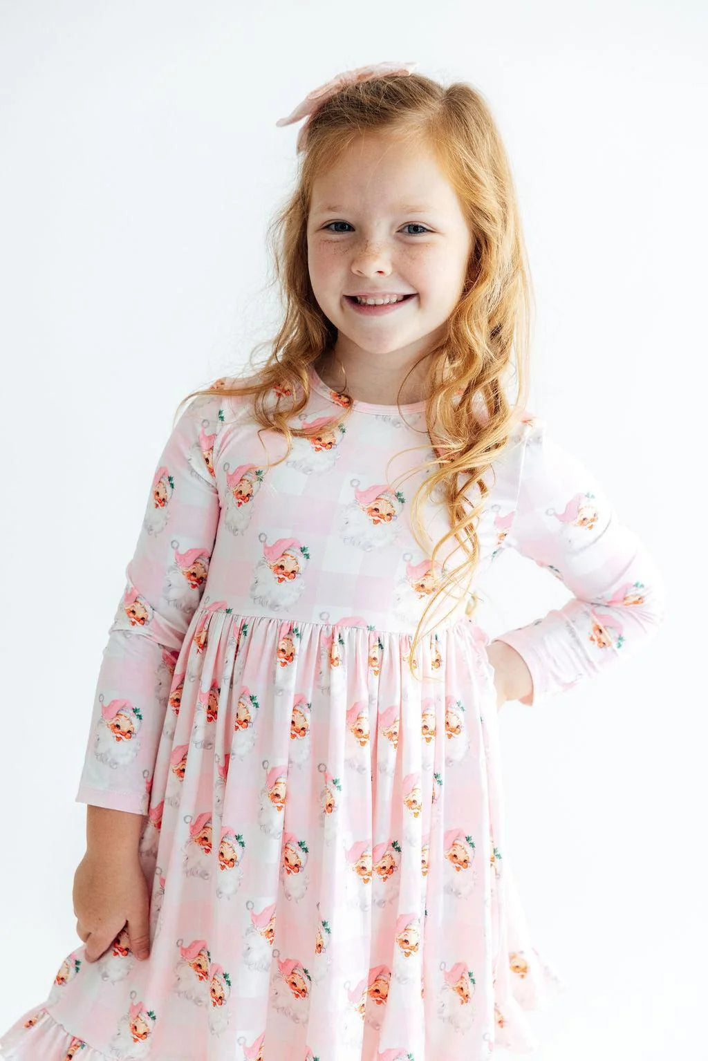 Model Wearing Mila & Rose Storybook Santa Ruffle Hem Twirl Dress