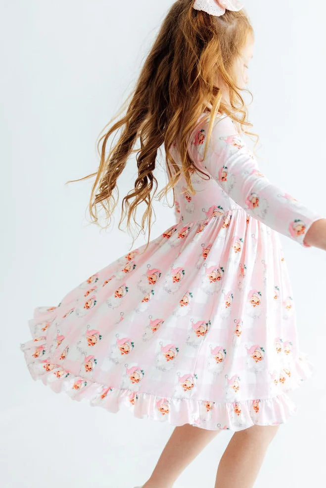 Model Wearing Mila & Rose Storybook Santa Ruffle Hem Twirl Dress