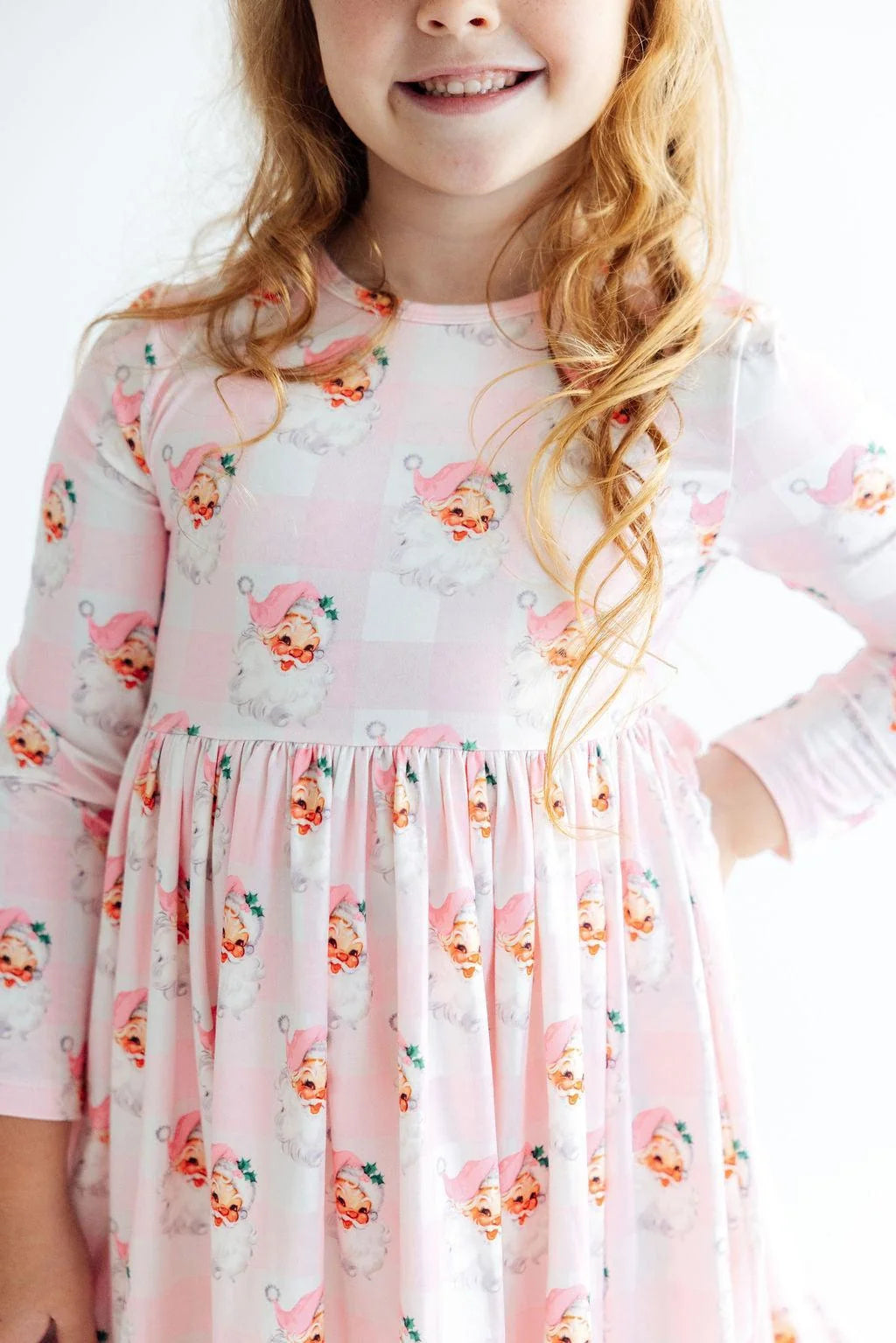 Model Wearing Mila & Rose Storybook Santa Ruffle Hem Twirl Dress